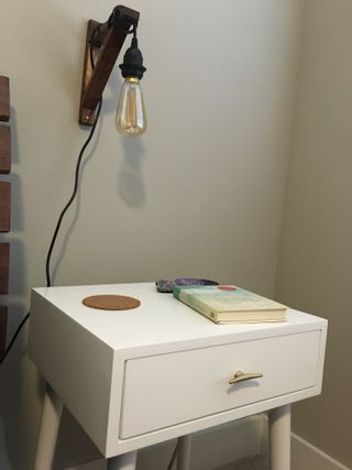 Side table with the new knobs and our DIY hanging pendant lamps