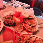 Charbroiled oysters from Acme Oyster House